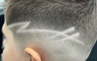 Creative shaved line design with a close fade